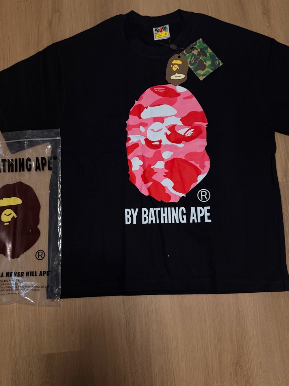 A Bathing Ape Black Short-Sleeve Tee with Pink Camo Ape Logo
